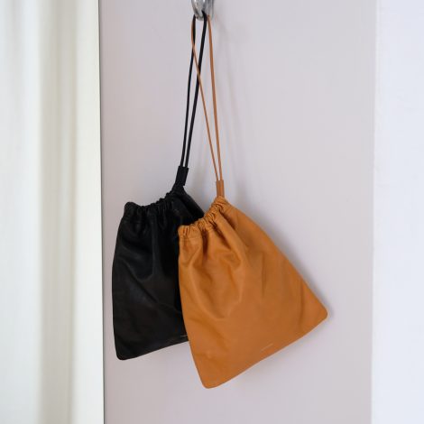 comesandgoes-cowleatherdrawstringbagsmall