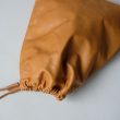 comesandgoes-cowleatherdrawstringbagsmall