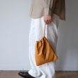 comesandgoes-cowleatherdrawstringbagsmall