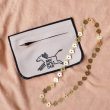 keyholder-floweretchedmetalnecklace